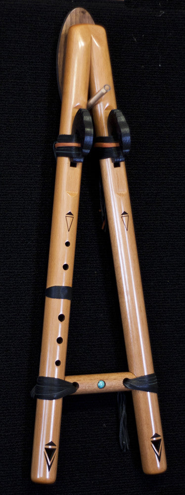 Display de parede para flautas duplas